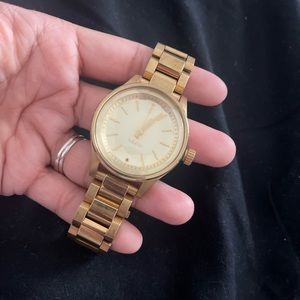 Womens Nixon gold watch